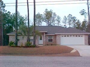 Living room & one bedroom has vaulted ceiling. Plant shelves, rounded corners in living area. Open kitchen, dining & living areas. Home has an additional room that can be used for an extra bedroom or family room. This is a must see house at a GREAT price.roof 2021HVAC May 2019water heater 9/2021stove 2019hurricane shutters in garagepatio added in 2007floors and paint May 2019