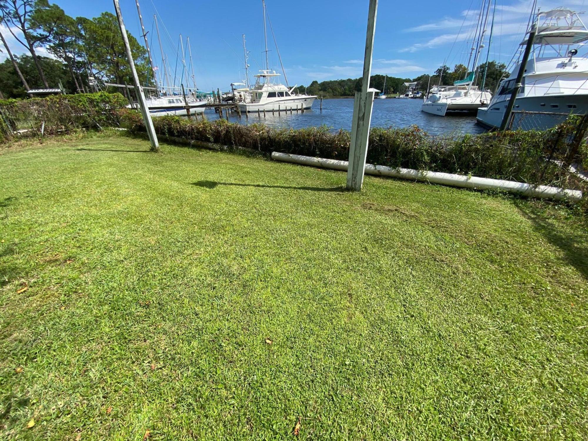 50' of waterfront ready for a deep water dock! Lot next door at 303 Edgewater is also FOR SALE by the same owner!Choose to do a full restoration of the home or tear down and build your dream waterfront home! Seller has put a lot of sweat equity into cleaning the property. Buyer agent to verify all measurements.
