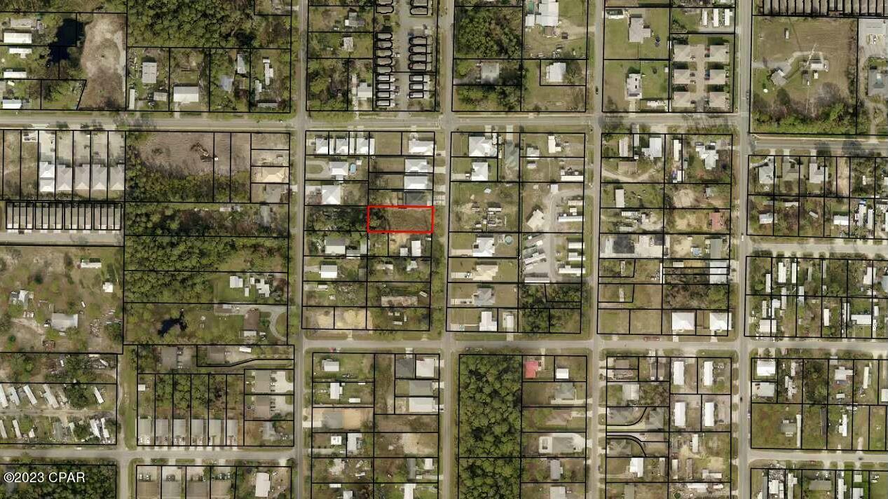 Large building lot with water, sewer, and electric, at site. This lot is a 1/3 of an acre within a short golf ride from beach, zoo, ripples, wonder works, and shopping.