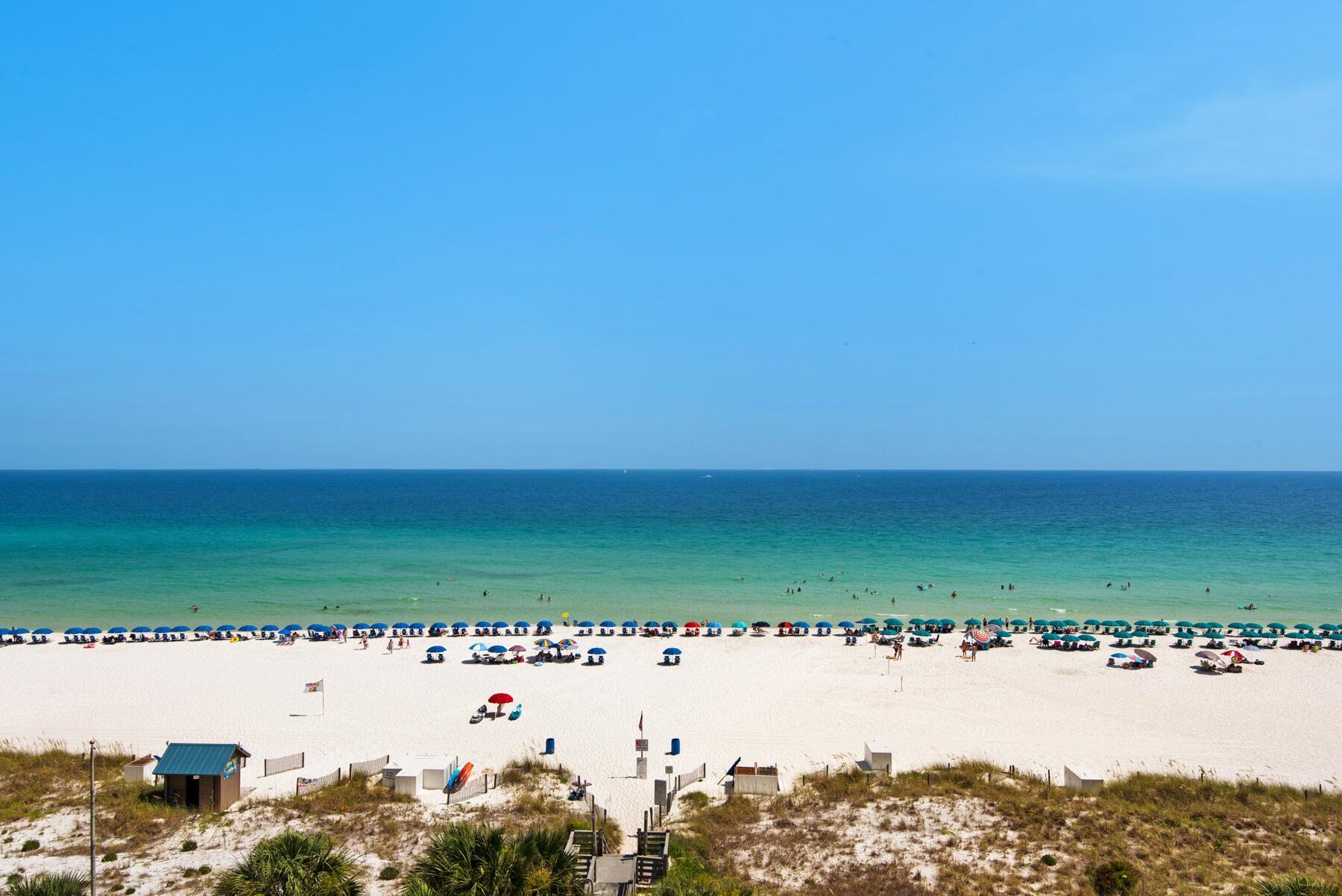 Welcome to Breakers East Condo, perfectly positioned in the heart of Destin, just steps from the sugar-white sands and emerald waters of the Gulf. Located in a gated community with unobstructed Gulf views, this beautifully maintained condo offers both a relaxing coastal lifestyle and a proven short-term rental track record.This spacious unit features a light-filled open-concept living and dining area with floor-to-ceiling sliding doors that lead out to a private beachfront balcony--ideal for taking in stunning sunsets and sea breezes. The fully equipped kitchen includes modern appliances, ample counter space, and a breakfast bar for easy entertaining.Both bedrooms are generously sized, with the primary suite offering Gulf views, balcony access, and an en-suite bathroom.