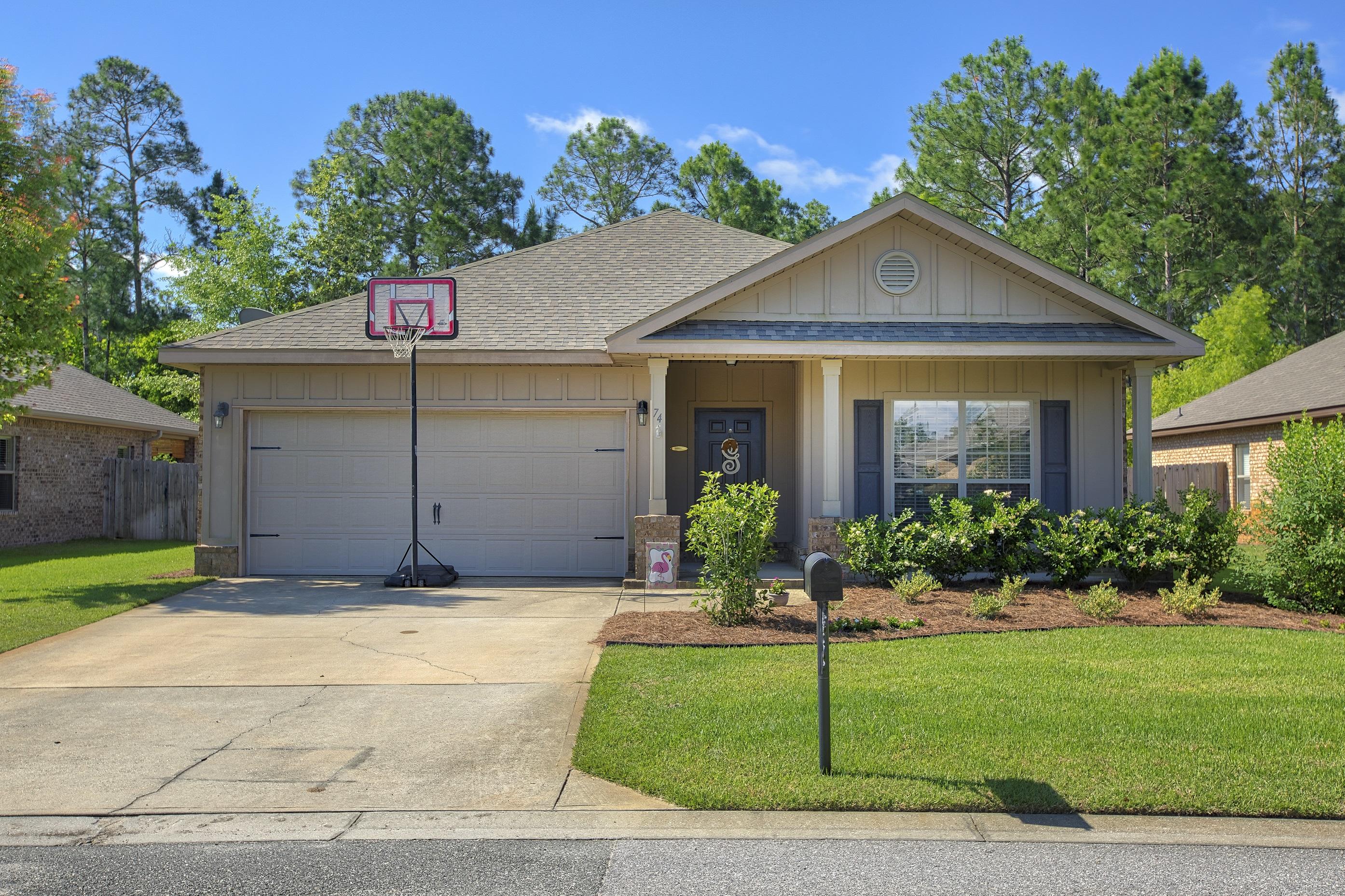 Price reduced! Take a look at this well maintained brick 4 BR 2 Bath home in the popular family friendly neighborhood of Whispering Lake Estates. This home has hardwood floors in the living spaces, carpet in bedrooms & tile in the kitchen and baths. The kitchen has beautiful cabinets, granite counter tops and stainless steel appliances. The home has a two car garage and fully fenced back yard. This South Walton neighborhood is centrally located near all shopping, dining, Sacred Heart Hospital and most of all just 2 miles to the white sand beaches of the Gulf. Call and schedule your viewing today. Information is deemed reliable but potential buyers or their Agents should confirm all to their satisfaction.