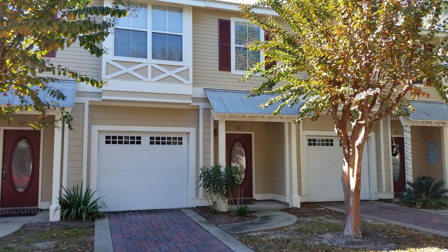 Lake view comes with this fantastic 3 bedroom, 2.5 bath townhome located in the heart of Destin. Great opportunity to own in this desirable subdivision convenient to the beautiful beaches, Destin Airport, shopping and restaurants. Cozy complex with only 28 units offers ample guest parking. Hardi siding, metal roof and paver drive for ease of maintenance and long term curb appeal. Open floor plan, with raised ceilings, adds to the spacious feeling. Kitchen has pantry and granite breakfast bar with large opening to living area. Master suite has large walk-in closet; nice bath with dual, raised vanity and garden tub. Inside laundry convenient to bedrooms. Seller is providing a home warranty for buyer. Enjoy a lake view from the covered patio. Don't wait, you'll miss out on this super home.
