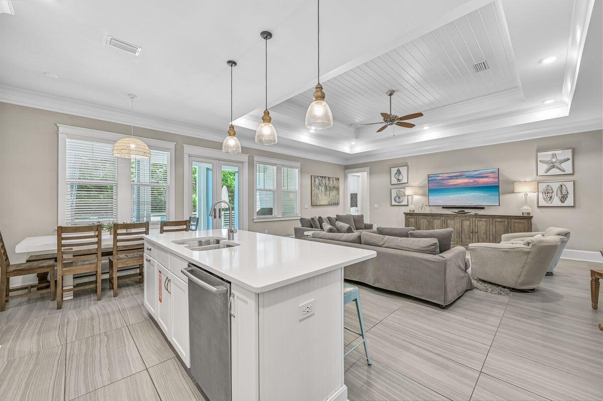 Gorgeous One Story home South of 30A - 6 bedrooms (6th bedroom is bunk room) PLUS bonus movie theater/game room. Plenty of space to enjoy the outdoors and entertain, over 900 square feet of patio and porch space, three large outdoor furnished areas for relaxing in sunshine or shade. The elevated sun deck backs to established woodland for privacy and extends to a dining area. You don't have to venture far to cool off in two community Resort Pools! Full home generator, plenty of parking.The Big Chill (formerly The Hub) provides ample dining, shopping and entertainment just 300' across the pocket park, grab lunch or dinner and bring it back to enjoy on the relaxing patio.