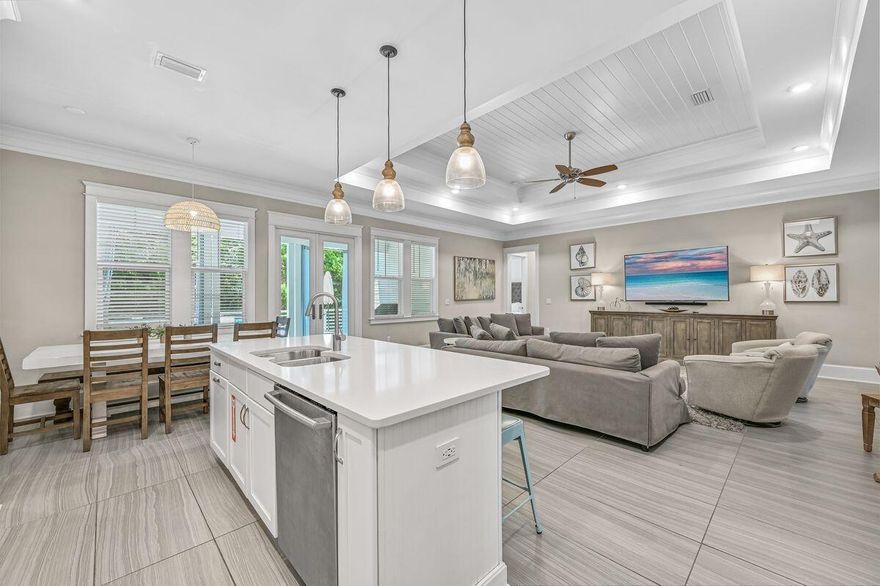Gorgeous One Story home South of 30A - 6 bedrooms (6th bedroom is bunk room) PLUS bonus movie theater/game room. Plenty of space to enjoy the outdoors and entertain, over 900 square feet of patio and porch space, three large outdoor furnished areas for relaxing in sunshine or shade. The elevated sun deck backs to established woodland for privacy and extends to a dining area. You don't have to venture far to cool off in two community Resort Pools!  Full home generator, plenty of parking.The Big Chill (formerly The Hub) provides ample dining, shopping and entertainment just 300' across the pocket park, grab lunch or dinner and bring it back to enjoy on the relaxing patio.