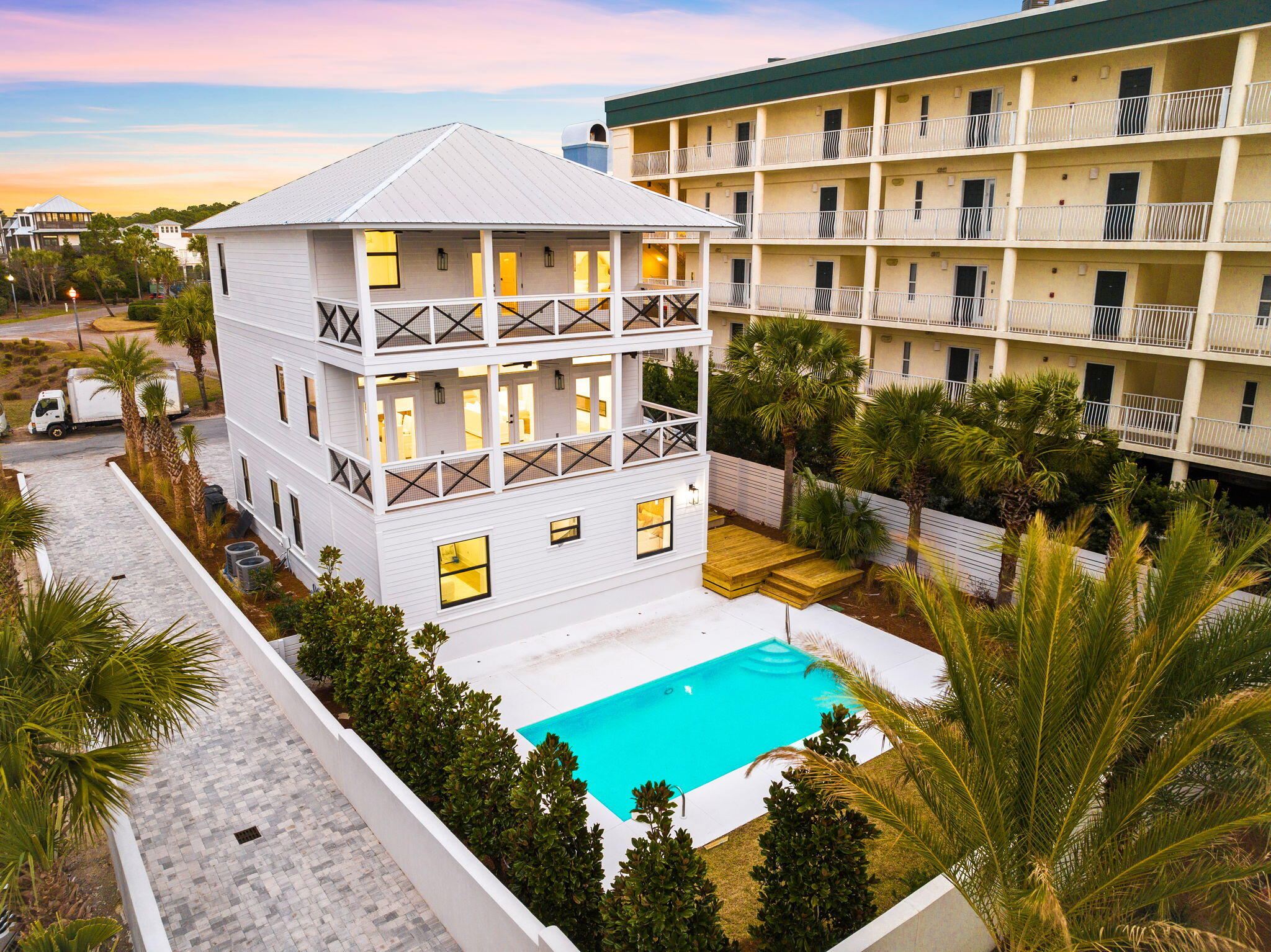 Indulge in luxury living just steps from the pristine Gulf of Mexico in this exquisite 5 bedroom, 6.5 bathroom haven, meticulously renovated to perfection. Situated in the heart of Seagrove, this home exudes unparalleled charm and boasts captivating views of the emerald coast, enhanced by its own private pool. Enter to find a sanctuary of beach elegance, where fresh paint, new flooring, state-of-the-art appliances, and upscale finishes adorn every corner, revitalizing this remarkable property. The expansive open living area is bathed in sunlight, with sliding glass doors leading to a spacious porch offering breathtaking Gulf vistas from the living and dining spaces. The custom kitchen, fully redesigned, is a culinary enthusiast's dream.