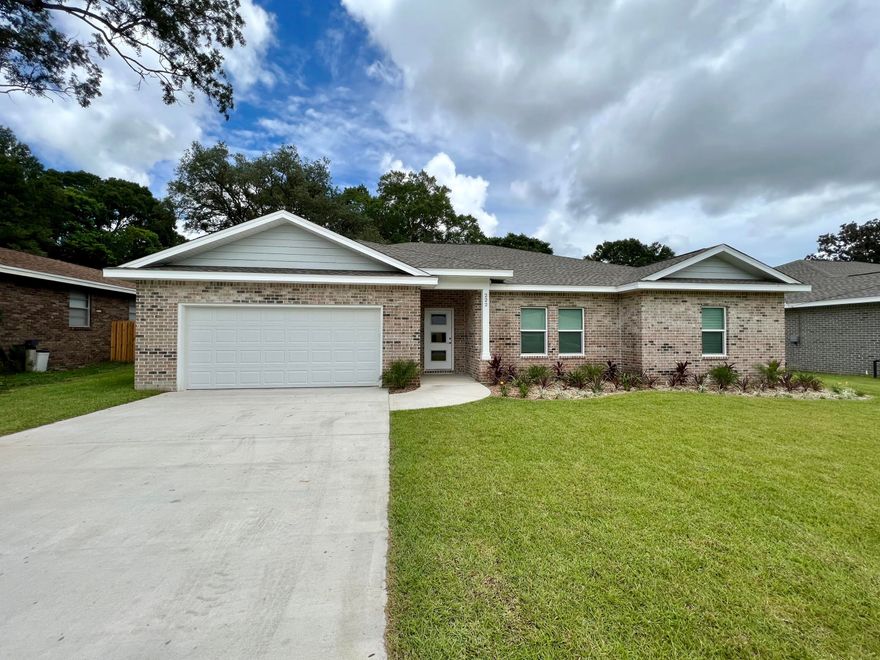 New construction by Hi-Lite Homes in the heart of Valparaiso just minutes from water access and Eglin AFB! Incredible quality of construction boasting brick siding, impact glass windows up to 150 mph rating, energy efficiency, GAF heavy duty 30-year shingles, manabloc plumbing system and Rinnai tankless water heater. Kitchen is loaded with stainless steel appliances, granite countertops, and custom cabinetry. Other interior features include tile and LVP flooring, 6-inch baseboards with shoe molding, media height cable outlets in bedrooms, wired for technology, soundproof master bedroom, jacuzzi tub in master bath and LED lighting throughout. Fully fenced in backyard. Valparaiso is a wonderful community