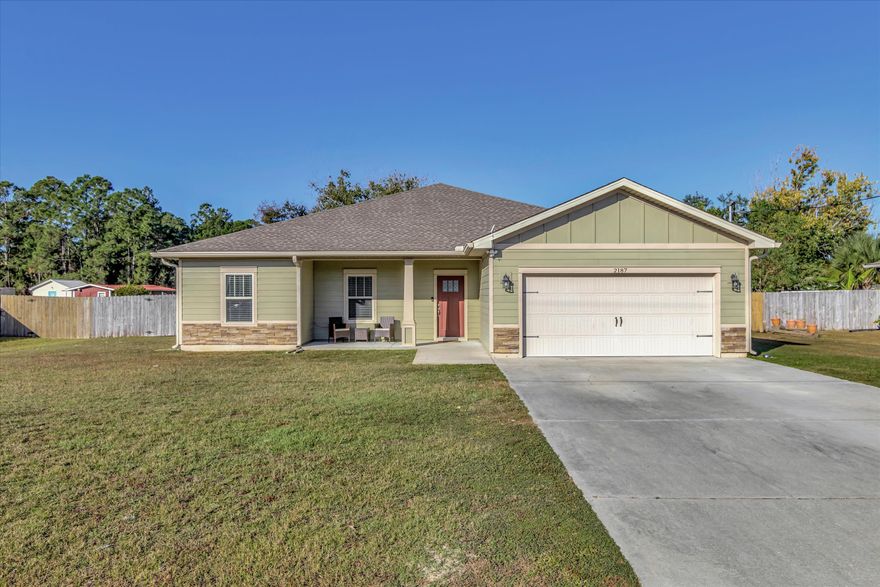 Under contract, accepting back up offers. Seller is willing to provide up to $10K for buyers closing costs or rate by down. This 1959 sq foot Craftsman style house has 4 bedrooms, 2 bathrooms is a beautiful find in Navarre. The house features an open concept floor-plan with high ceilings, crown moulding, expansive cabinetry in the kitchen complimented by large granite counter tops and a wood laminate floor that really pulls the whole open space together. The Master bedroom is large with an ensuite that makes for privacy away from everyone. The property sits on a flat .3 acre lot and is also easy commuting to the beaches and the bases. Do not miss this home, schedule your showing now.