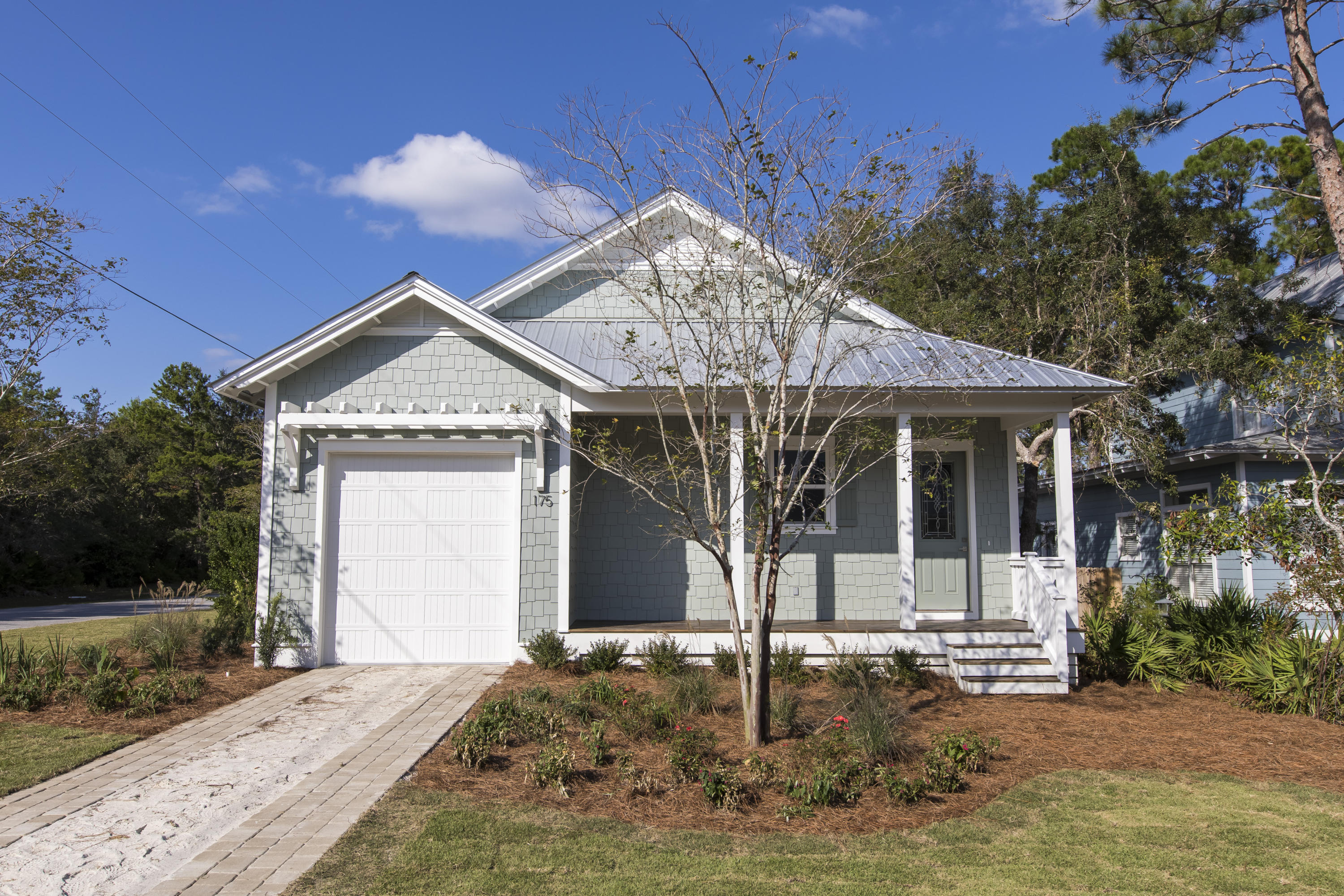 This gorgeous new construction home is near completion and ready for purchase. Located on a large corner lot, just 1 block from Choctawhatchee Bay in Point Washington. The home boasts 3 bedrooms 3 baths with beautiful upgraded finishes like marble countertops, floor to ceiling tile in the baths, large walk-in master closet, vaulted ceilings and hardwoods throughout all main living areas as well as the bedrooms. The home offers many desirable coastal accents as well like shiplap walls and and shake siding. The punch list is being completed and soon the final touches of sod and fencing will be in place.Enjoy the nearby public picnic, dock and neighborhood boat ramp, and you're only 10 min away from beach access.