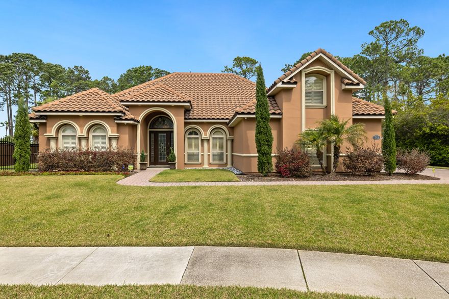 Imagine 2x or 3x the luxury at half the price just 20 miles east of Miramar Beach!  Exquisite Mediterranean home in a gated subdivision that features luxury family living in the heart of Panama City Beach. The home was built by Thad Brown and was featured in the Parade of Homes 2007. This gorgeous home backs up to preserves- which maximizes your private experience. The backyard is stupendous for memorable, unmatched outdoor entertaining with a vast, all deluxe paver patio (crushed gravel underneath) complemented by an outsized gorgeous, in ground, saltwater, heated pool complete with fountain and ambient features. A large pergola also compliments the outdoor sanctuary with doubled wood on top for extra sun protection and powered with electricity for those memorable party and birthday events. Strike up the band! Pool, pergola and pavers installed in 2019To compliment the outdoor tropical escape is a huge, heavy duty, screened in porch (over 1000 sq ft) with an outdoor kitchen area and fireplace. There is also plenty of side yard space with the best of zoysia sod on the west side of the home behind privacy fencing (plenty of room for pets to play), and throughout the front yard, the home is lushly tropical in its landscaping and outside decorum. The east side of the home has double gates with plenty of room to bring an RV or boat inside the fenced area while still having room for another 8-10 cars on the paver driveway. The oversized, two car garage has additional storage and work space for all your toys. Two large size cars can still easily fit. The electric garage opener was just recently replaced. The entry of the home has an etched glass 10ft door with a grand entry of 14 ft ceiling in the foyer and , 12 ft trey ceiling in the living room and master bedroom, inlaid with double crown custom features. The home has elaborate crown molding throughout with plantation shutters gracing the windows. There is a formal dining area as well as a less formal breakfast area. The flooring in the main areas are all hardwood, wet areas are tile, custom travertines in the master bath, all countertops in the kitchen and baths are granite. One of the large bedrooms is dually equipped as a media room. There are his and her walk in closets in the master suite. All closets are California cabinet and shelving equipped. The home is equipped with LED lighting throughout, it is surge protected, bull nose corners and many built ins throughout with two gas fireplaces and outdoor gas hookup for the barbecue grill. The attached technology will remain, including TV's and speaker system throughout. In addition to the 4 BR there is an upstairs bonus room that can be a 5th bedroom or work out room, sizable office or homeschooling space. There is also a huge accessible attic space with plenty of decking for storage. It would not take much to make that another space under air if one so wished. Even the bathrooms have a faux painted finish, which is emerging once again as an interior luxury design. The air conditioning system was replaced in 2019, new built in appliances and dishwasher in 2020 (all stainless), the pool added with all equipment 2019, insta hot water heater in 2020. There is also a new Rainbird sprinkler system and a custom built, extra reinforced privacy and aluminum powder coated fencing above a retaining wall, raising the yard substantially above flood zone x. The exterior of the home was just recoated with top of the line acrylic latex paint and equipped with extra sized leaf protected gutters.