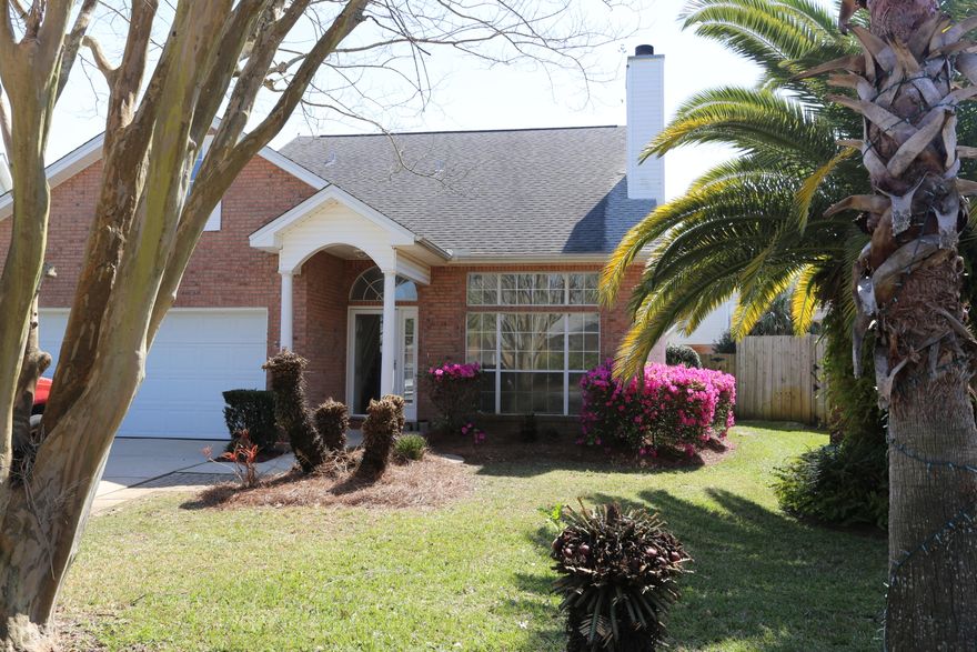 Beautifully upgraded, light-filled turn-key home with new appliances. Spacious eat-in kitchen w/granite countertops & marble backsplash. Wood flooring downstairs and upstairs with tile in kitchen. Four large bedrooms make this the perfect family home!  Garage converts to screen room for added play & work space. Private yard with beautiful lap pool, high fence, patio pavers and room for entertaining. Custom pool w/gunite benches, waterfall, and hydrojets. Monthly pool service included. Quiet neighborhood with convenient location to military bases, businesses, markets, restaurants and just minutes to the beach!