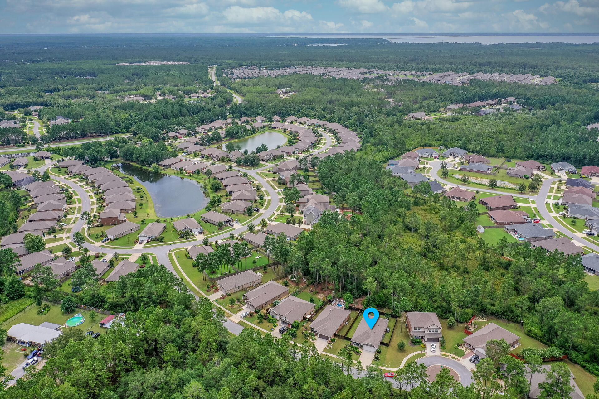 PRIVATE LOCATION IN HAMMOCK BAY YET CLOSE TO EVERYTHING. OPEN HOUSE WED 10-12. Nestled on a quiet cul-de-sac w/a Nature Preserve in the back & no homes in the front, you'll love the peaceful, private setting of this gorgeous home, yet be only a short walk or bike ride away from the clubhouse, pool, tennis courts, fitness center, walking trails & parks! Ten ft ceilings, unique archways, beautiful wood look tile floors throughout the main living areas, newer LVP in the bedrooms & gorgeous kitchen w/custom gray cabinets, granite counters & large island/eating bar accent this stunning home. A separate office/den could be a 4th BR. Large Master w/tray ceiling & en suite bath w/tub & walk-in-shower located away from other BR's. Exhale & relax on your wonderful covered patio w/morning coffee or
