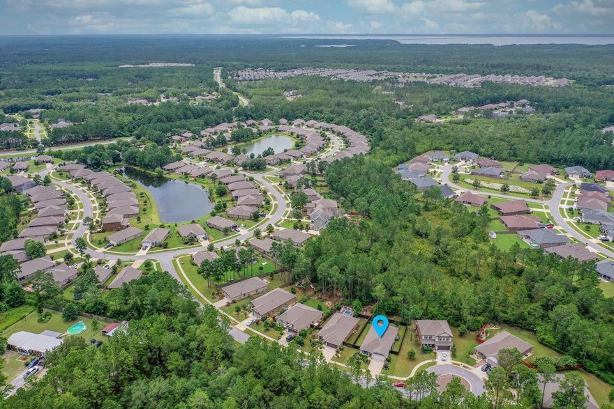 PRIVATE LOCATION IN HAMMOCK BAY YET CLOSE TO EVERYTHING. OPEN HOUSE WED 10-12. Nestled on a quiet cul-de-sac w/a Nature Preserve in the back & no homes in the front, you'll love the peaceful, private setting of this gorgeous home, yet be only a short walk or bike ride away from the clubhouse, pool, tennis courts, fitness center, walking trails & parks!  Ten ft ceilings, unique archways, beautiful wood look tile floors throughout the main living areas, newer LVP in the bedrooms & gorgeous kitchen w/custom gray cabinets, granite counters & large island/eating bar accent this stunning home. A separate office/den could be a 4th BR. Large Master w/tray ceiling & en suite bath w/tub & walk-in-shower located away from other BR's. Exhale & relax on your wonderful covered patio w/morning coffee or a sunset cocktail enjoying natural views.  The fenced backyard provides privacy and plenty of room for relaxation, play and/or a pool.  Other features include large master walk-in-closet, laundry room, large pantry, custom light fixtures, floored attic space for storage & irrigation system w/new pump. Located in the master planned community, Hammock Bay with beautiful lakes, walking trails & first class amenities just a short walk or bike ride away, start living the relaxed, turnkey lifestyle you've always dreamed of. 