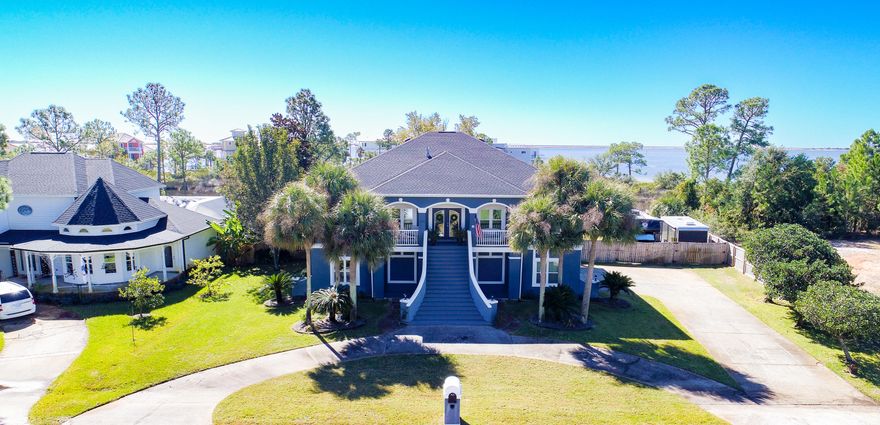 **VA assumable Mortgage at 2.75%. Also flood insurance to transfer at closing to new buyer under $1,200 yearly...Magnificent Santa Rosa Sound Views! This ultra spacious custom-built, two story home in the waterfront community of Biscayne Pointe offers a private pool and deeded access to the Santa Rosa Sound. A majestic staircase welcomes you to a spacious second floor living area. Upon entering you will find 12 foot ceilings, custom lighting and sound system, travertine flooring, a double sided gas fireplace, 3 sets of french doors all with astonishing views of the Sound. Step out to the 2nd floor screened-in deck area and enjoy the Gulf breeze. Chef's kitchen has a gas range, stainless appliances, endless pantry space, granite counters, and large island. Master bedroom suite has been