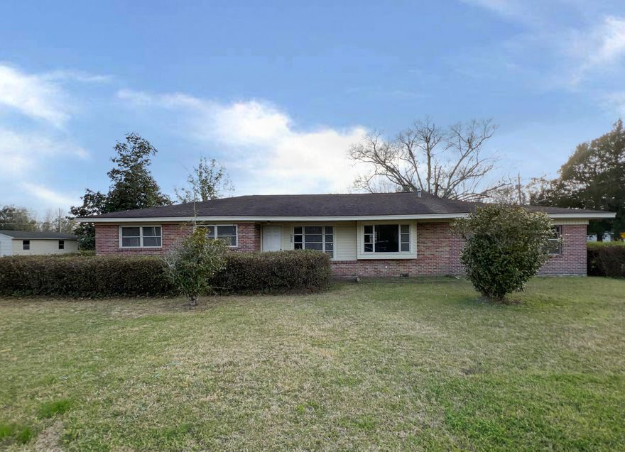 Located in the FL/AL border city of Century, this established REO home is mostly in it's original form and based on todays prices, the wood alone on the interior would cost a fortune! Home's original 2 car garage was converted to living space, but is not included in the advertised square footage. Home has 3 bedrooms, 1 and 1/2 baths, a dining area, breakfast nook and tongue and groove wood throughout the home. Resting on a 0.83 acre lot, this home has all brick exterior with a crawl space and 2 storage buildings. A definite must see to appreciate!