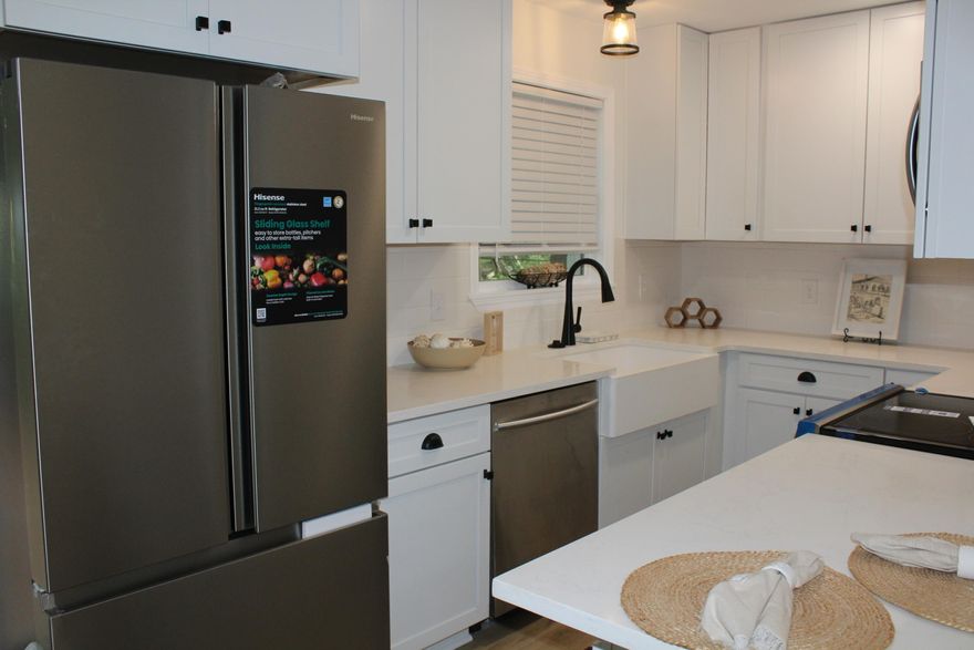 Newly Renovated all brick home with approximately 1248 sq ft, 3 bedrooms and 2 baths close to the beaches, shopping, and restaurants in Fort Walton Beach, FL. New roof, new electrical, new plumbing, new kitchens and baths, newly painted interior and exterior, new doors and hardware, new appliances, new LVP flooring and black and white tile in bathrooms, new base molding, new lighting, new recessed lighting, ceiling fans, and chandeliers, newly landscaped front yard, new sprinkler motor and system, new HVAC and duct system.