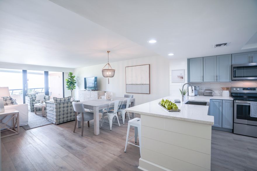 Take a close look at unit 307, this beautiful and professionally remodeled & redecorated unit in 2020 by the designers from Scenic Lifestyle Designs, LLC.  Edgewater Beach Condos offers gorgeous gulf view from the LARGEST 2 bedroom floor plan available at Edgewater.  The ceilings have been  scrapped & freshly painted along with entire unit.  No feature has been neglected. The unit has  NEW kitchen cabinets & stainless steel appliances & new white quartz countertops throughout the unit. New Bathrooms & a new tub & new tile shower in master bedroom . New Furniture & mattresses & large flat screen tvs in all bedrooms and living room. The guest bedroom is large enough to accommodate two new Queen size beds. Ideal for the rental investor. Please look at the new flooring throughout the unit.