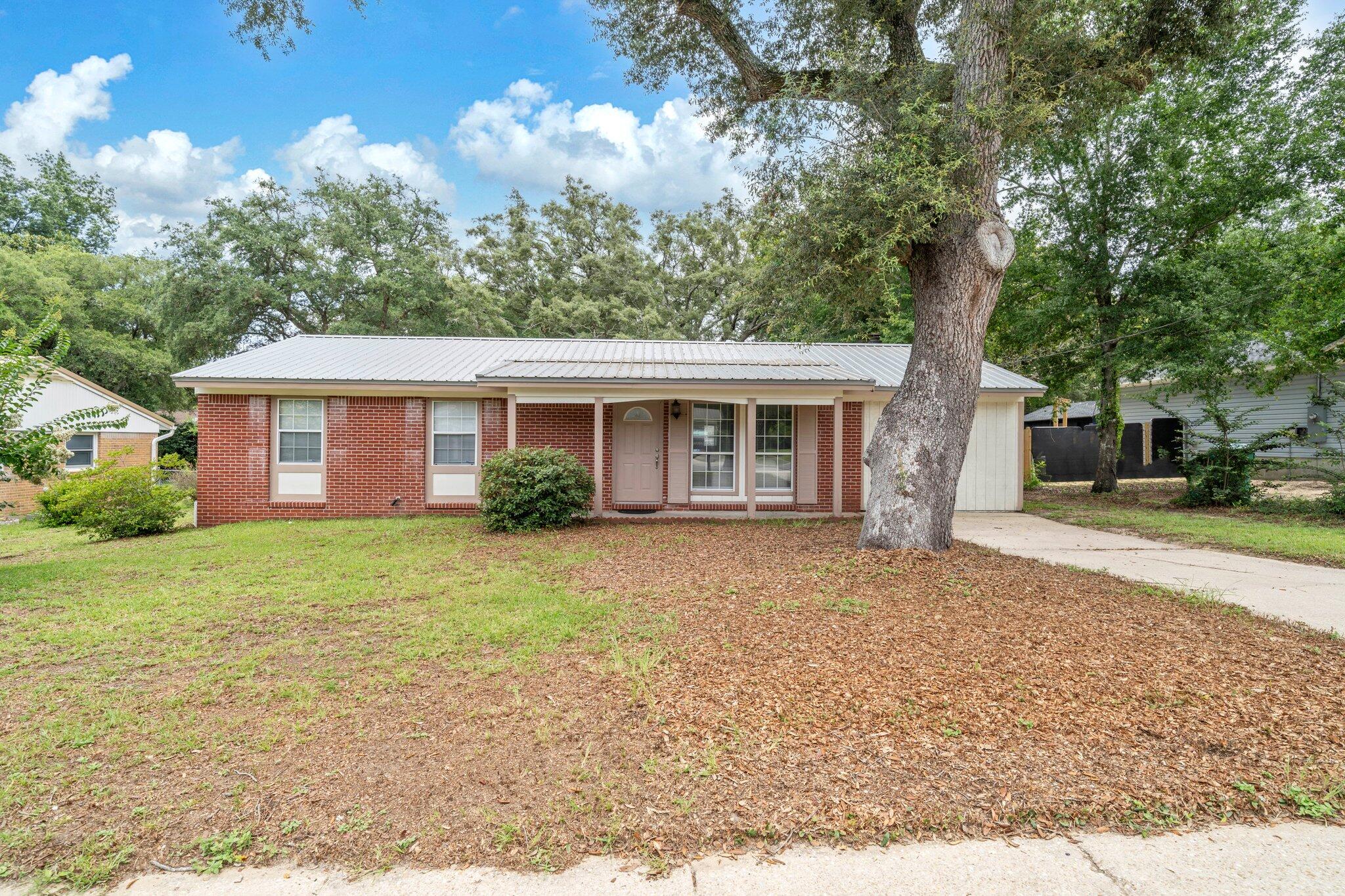 Adorable 3 bedroom and 1 bath home with 1350 sq feet centrally located in Niceville, FL. This community some of the best schools in the State of Florida! Insurance will not be an issue! The roof and HVAC were replaced in 2023 and the water heater was replaced in 2022. The home owner is getting the home rewired! This home has new flooring, paint, and light fixtures. The kitchen has updated countertops, a white refrigerator 2023, white slide in oven and stove 2023, and a dishwasher. There is also a separate heated and cooled laundry room. The back yard is large and partially fenced. This home is in a perfect location in Niceville and is close to shopping, restaurants, churches, and schools. Buyer to verify all dimensions and information.
