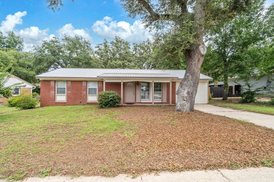 Adorable 3 bedroom and 1 bath home with 1350 sq feet centrally located in Niceville, FL. This community some of the best schools in the State of Florida! Insurance will not be an issue! A whole house rewire was done 2025, the roof and HVAC were replaced in 2023 and the water heater was replaced in 2022. The home owner is getting the home rewired!  This home has new flooring, paint, and light fixtures. The kitchen has updated countertops, a white refrigerator 2023, and a white slide in oven and stove 2023.  There is also a separate heated and cooled laundry room. The back yard is large and partially fenced. This home is in a perfect location in Niceville and is close to shopping, restaurants, churches, and schools. Buyer to verify all dimensions and information.