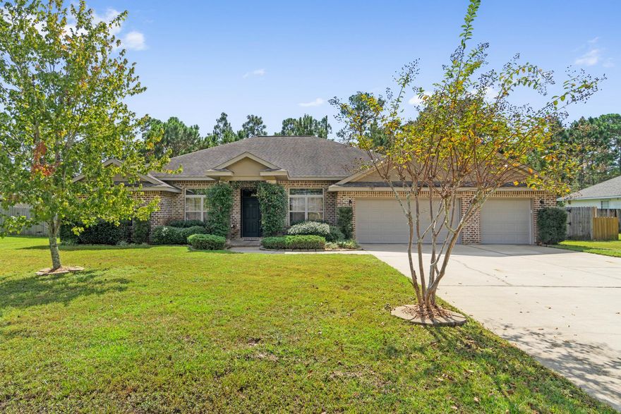 Welcome to this beautiful Robbins-built home located in a wonderfully peaceful area of Navarre. This home offers plenty of space to entertain over the holidays or just for a casual get together. With 4 well-sized bedrooms, 3 full baths, a formal dining room, a private office and a beautifully arranged open floor plan, the opportunities are endless. It may be hard to choose between pulling up a seat at the kitchen island, the nearby breakfast room overlooking the large backyard or in the separate formal dining room. This culinary oasis, complete with a gas stove, expansive cabinetry, and granite countertops, will be a wonderful place for you to show off your culinary skills. After a great meal, you can retreat to the spacious main living area.