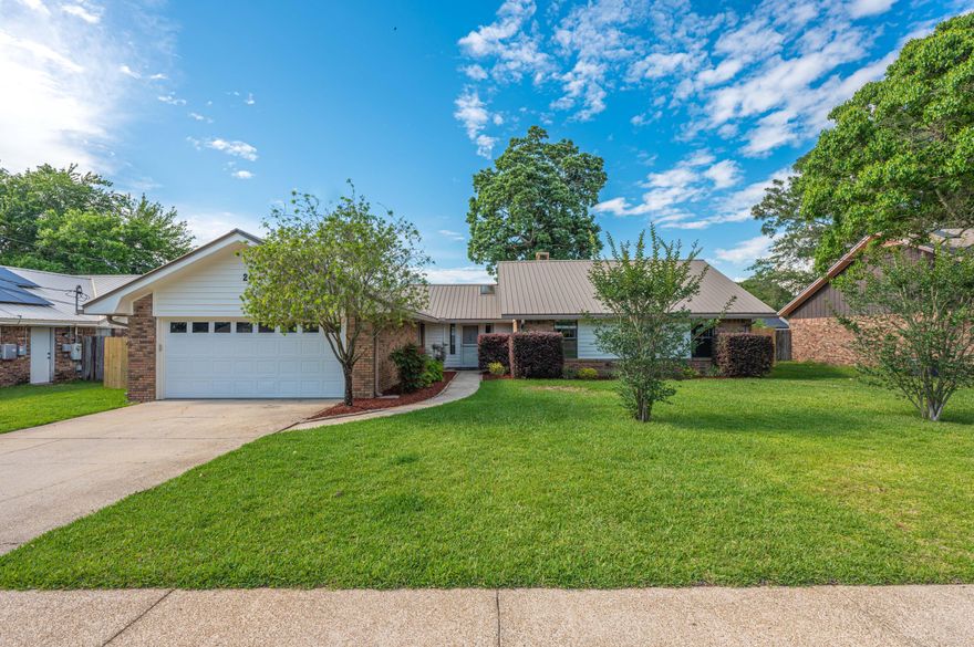 Introducing a remarkable property in a highly sought-after neighborhood! This home showcases a range of impressive upgrades including new LVP flooring, a new stainless steel fridge, and a brand-new AC and heat unit for your ultimate comfort. The roof, installed in 2011, offers reliability and peace of mind. Step inside to discover the tasteful additions of new fans and lights throughout. The bathrooms have been beautifully updated with new vanities featuring luxurious quartz countertops, complemented by the exquisite tile surrounds in the showers. The new toilets add a modern touch. The kitchen is a chef's delight, featuring stainless steel appliances, granite tile countertops, spacious cabinets, and a large pantry to fulfill all your culinary needs. The convenience of having laundry