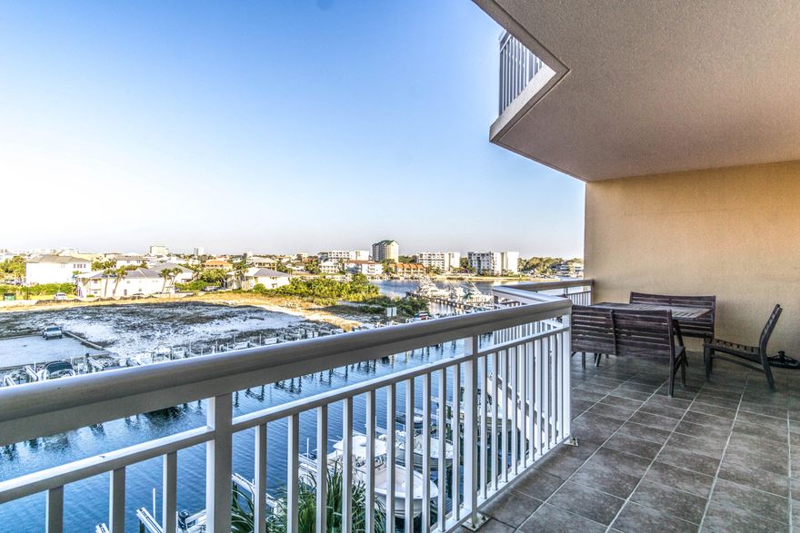 Welcome to your very own vacation destination! This spacious unit has sprawling views of the Destin Harbor and the Gulf of Mexico! Don't miss this opportunity to own the lowest price unit in Harbor Landing! Beautifully donned with granite counters throughout, crown molding, tray ceilings, and other touches that you don't want to miss. NEW A/C and washer and dryer installed in 2015, NEW dishwasher installed in 2016. Call today for your showing!!