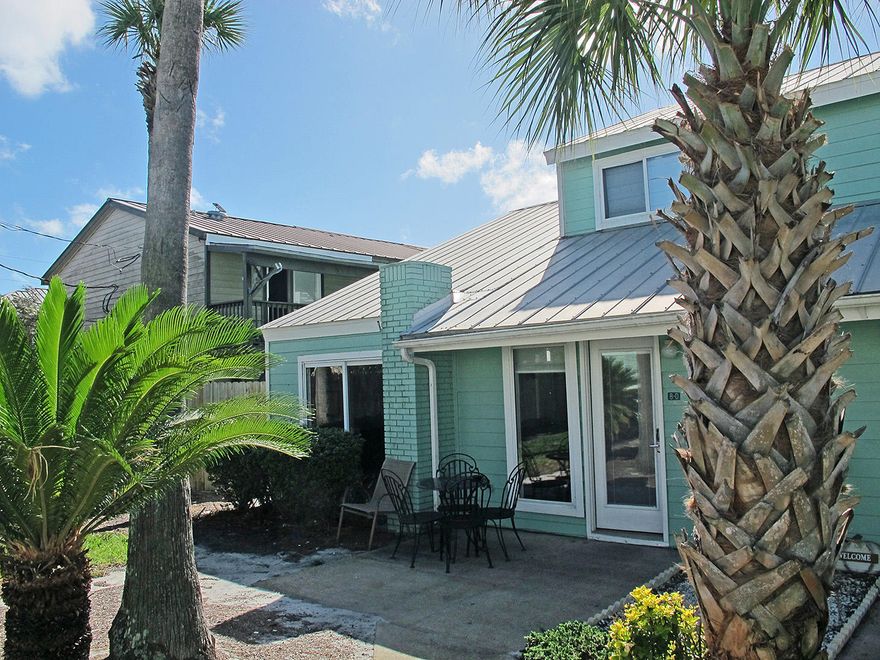 Charming Florida cottage in Sea Cabins Townhomes with deeded beach access directly across the street! Established rental history grossing more than $40,000 annually (2020 is somewhat lower due to COVID-19 and increased owner usage). BRAND NEW ROOF! Fully appointed kitchen provides small appliances, cookware, dishes and flatware, a breakfast bar, and even has a compact dishwasher! There is also a full size stacked washer/dryer in a closet next to the kitchen. HVAC and water heater were installed in 2010.The townhouse sleeps six with a king size bed in the master bedroom upstairs, a bunk room  on the ground floor with two twin beds, and a pullout sofa in the living room. The living room, master bedroom and bunk room all have flat screen TVs (keep reading...)