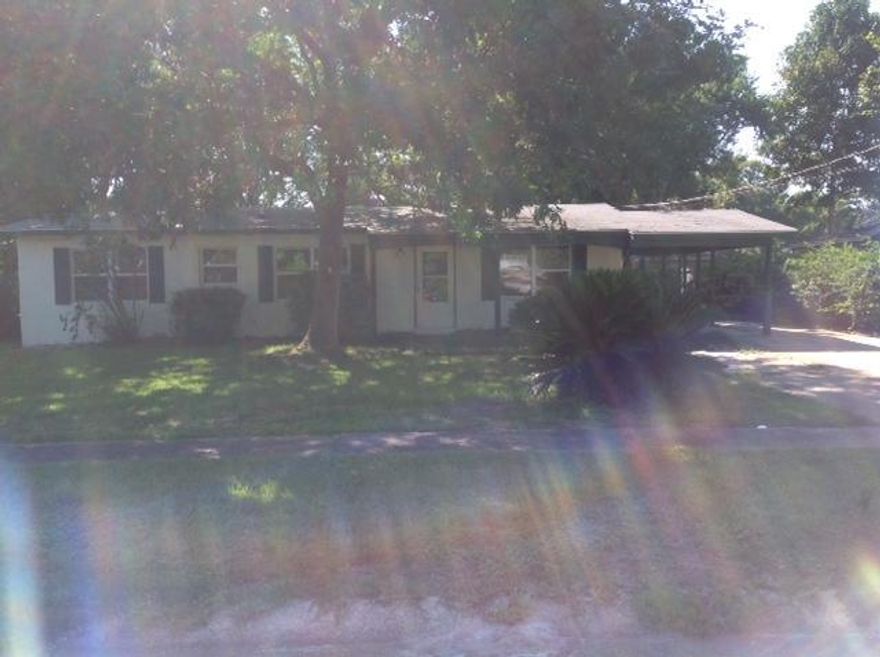 Great Investment Opportunity! Three bedroom two bathroom home that features over 1700sqft of living space, formal dining room, den and huge family room with cathedral ceilings and sliding glass doors that lead out to the fenced backyard and nice yard building for extra storage.