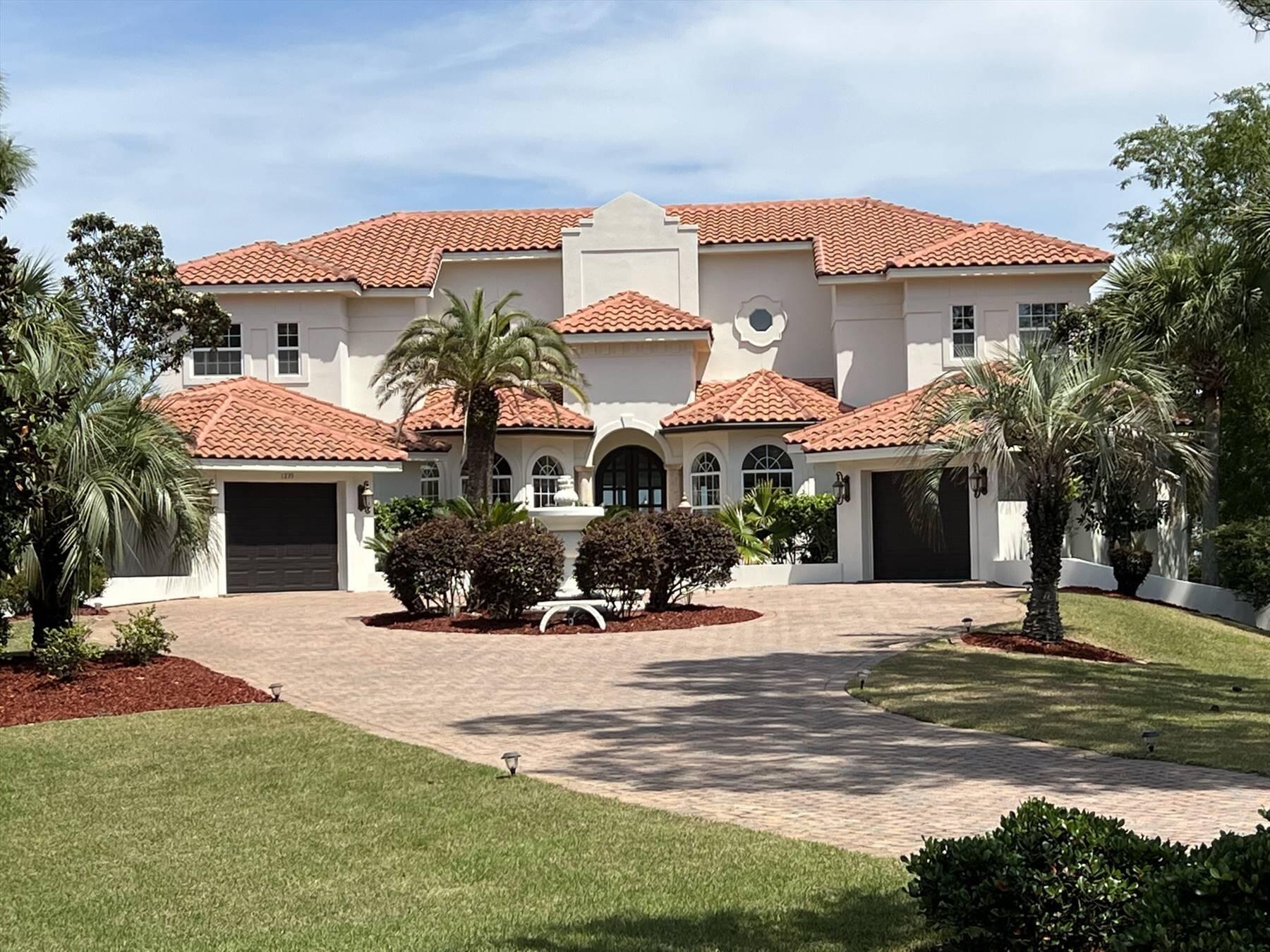 A magnificent custom Mediterranean estate situated on 100 ft of Choctawhatchee Bay. This showpiece's timeless, luxurious appointments; open, airy floor plan; and opulent landscaping are matched in exquisiteness only by the surrounding natural scenery. A large expanse of glass seamlessly merges the interior with the outdoors. A spectacular, fenced-in bayfront oasis features a large pool and covered sitting area. Incredible Sunrise views. This home offers master on the main, 2 master suites on 2nd floor, a study and a separate media room that can easily be turned into a 5th bedroom. Both the 1st floor and 2nd floor master suites offer outdoor access and luxurious en suites. Just 7 minutes north of Sandestin/Grand Blvd and 15mins to 30A. Exterior freshly painted all white. Bank Qual required