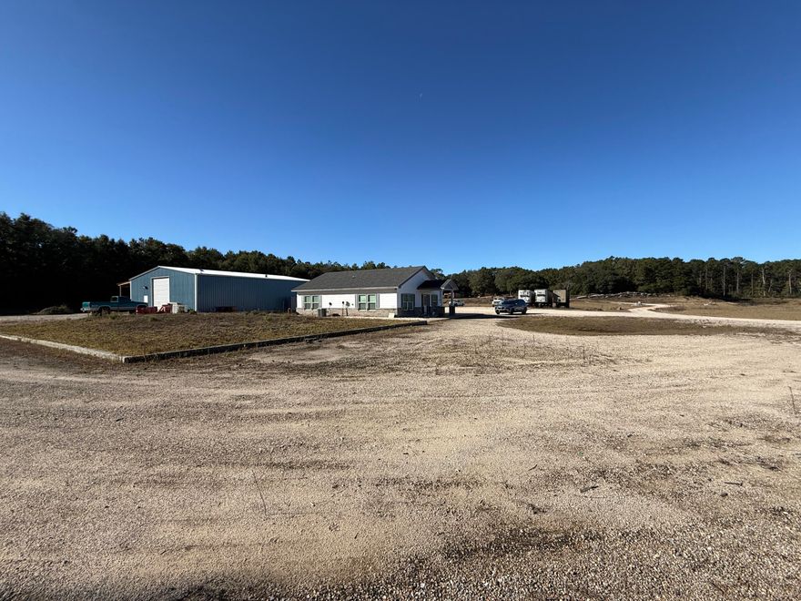 Prime 25.84+/- Acre Mixed-Use Opportunity in Growing Freeport, FloridaPositioned in the rapidly developing community of Eastern Freeport, this expansive 25.84+/- acre parcel offers exceptional flexibility for investors, builders, and end-users. Located just off Highway 20 East--with access via a 55+/- foot ingress/egress easement--this property combines strategic location, valuable zoning diversity, and existing improvements to support a wide range of future uses.Approximately 75% of the land features average elevation and has been partially excavated for fill dirt, offering a head start for construction or site development. The northern 25% includes a natural low/pond area, adding potential for creative site planning or environmental integration. Public utilities are available to or near the property.

Zoning classifications include I-1 (Light Industrial), R-2 (Medium Density Residential), and SDD (Special Development District), providing rare versatility for industrial, residential, or mixed-use development.

Built in 2021 and in good condition, existing improvements include:

1,280?? sq. ft. office building

3,000?? sq. ft. warehouse with attached shed

Dirt drive access

Underground electrical service

Private well and septic system

Whether you're seeking a light industrial site with existing infrastructure, a residential development opportunity, or a mixed-use project in a thriving Walton County market, this property delivers unmatched potential.