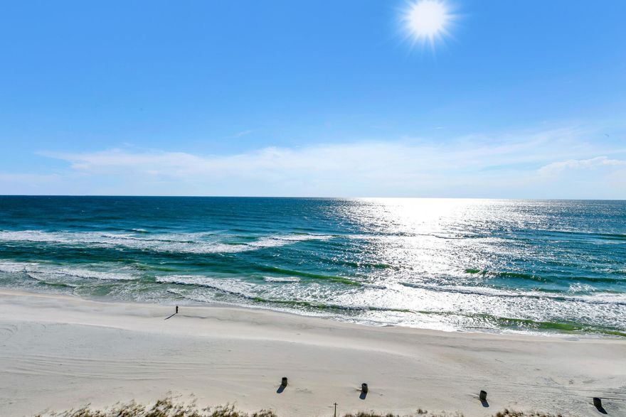 This delightful condo has been lovingly cared for by its current owners, who have cherished it for the last 10 years as their retirement home. While it's clear that the home has been well-maintained, it offers exciting potential for a new family or individual to make it their own. With INCREDIBLE beach views from the primary bedroom, the property exudes warmth and comfort. It features 2 bedrooms, 2 1/2 bathrooms, and a cozy living area perfect for both everyday living and entertaining. When you walk into this gulf front residence, you can be greeted by beams of sunlight overpowering the shadows, with an electric heating fireplace that will add character and charm, creating a welcoming atmosphere throughout. Many updates have been done since these owners bought the condo. One of these is a completely remodeled kitchen with quartz counter tops, soft-close drawers, stainless steel Whirlpool appliances including a double oven. Both of the full baths were also modernized with accessibility features added. These owners also upgraded the flooring in the bedrooms with beautiful LVP flooring. The home has been thoughtfully outfitted with accessibility in mind. The Harmar stairlift ($6000) was installed a few years ago make it easy to navigate up the stairwell to both bedrooms. Both full baths have grab bars to further assist those individuals with mobility challenges. As an added convenience, all utilities are included in the HOA fees in Pinnacle Port, including electric. While this particular condo has been loved as a homestead for the last decade, short term rentals are allowed. Rates have ranged as high as the 40's in the past. Conveniently located in the confines of this gated subdivision are dining, bike rentals, a gym, a gift shop and more! You are just a red light away from Publix, CVS and Winn Dixie pharmacies, and about a 15 minute drive to the airport. This condo provides the perfect balance of privacy and accessibility. Whether you're looking for a place to move right in or a space to update and personalize, this home offers incredible value and the opportunity to create lasting memories.