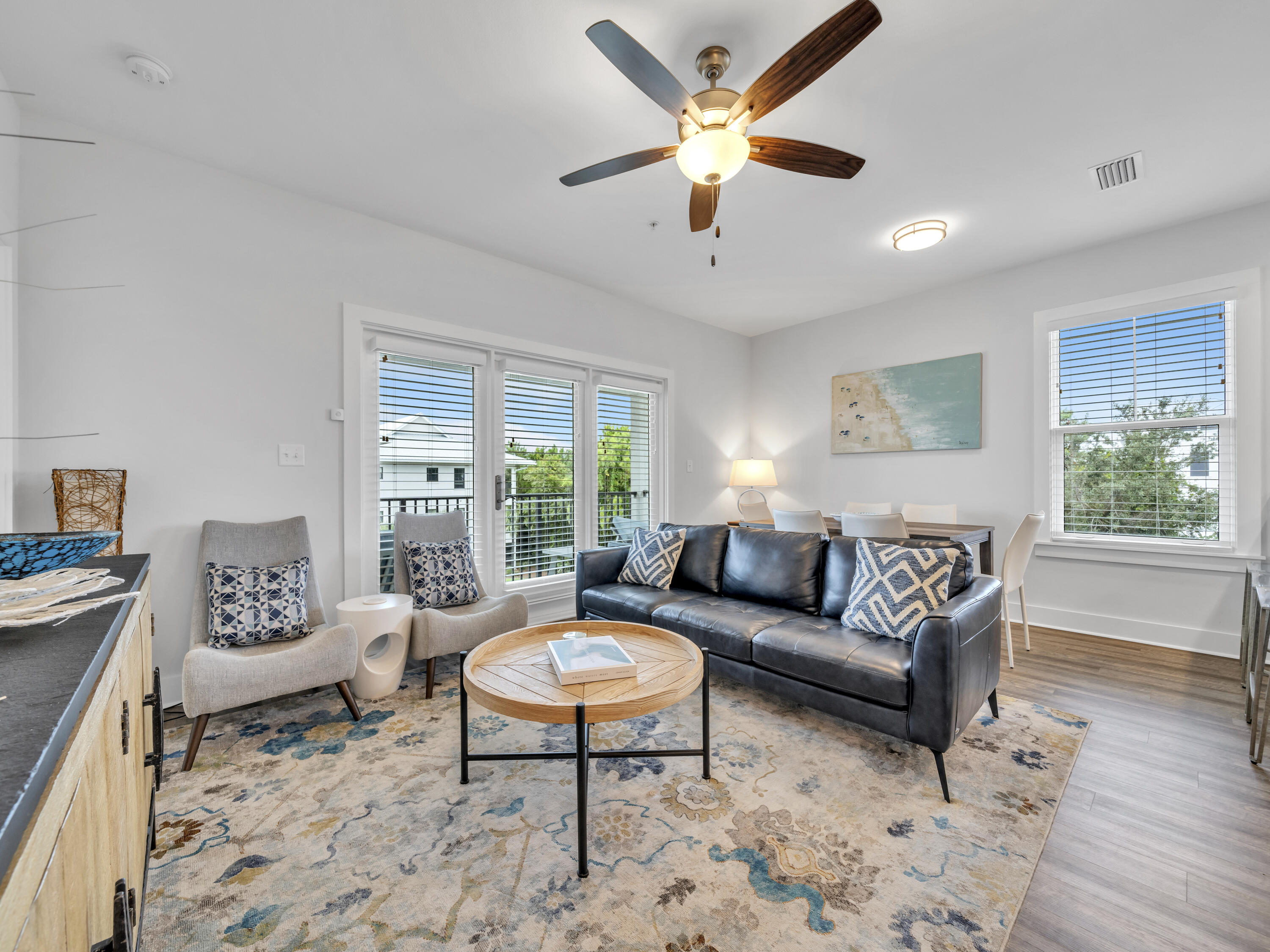 TOP FLOOR MODERN LUXURY & RENTAL READY! Enjoy the relaxing beach life on the west end of Scenic Highway 30A in this top-floor, 3 bedroom, 2 bath condo at Hidden Lake Condominiums. Nestled between picturesque Blue Mountain Beach and Gulf Place on 30A, Hidden Lake offers a blend of modern luxury and beachside tranquility. This southern end unit has a peek-a-boo gulf view through the trees and is being sold fully furnished and turnkey for the next owner to enjoy. This upgraded condo features shiplap accent walls, 9 ft. ceilings throughout, modern LVP flooring, and granite countertops in the kitchen and baths, along with high-end coastal chic furnishings. The condo opens to an expansive covered balcony that stretches the length of the unit, perfect for enjoying the serene surroundings. Community amenities include a relaxing zero-entry pool, fully equipped fitness center, and the development is gated for added security. Hidden Lake is positioned within walking distance of two public beach accesses and is centrally located to the many boutique shops and restaurants in Gulf Place and Blue Mountain Beach. 