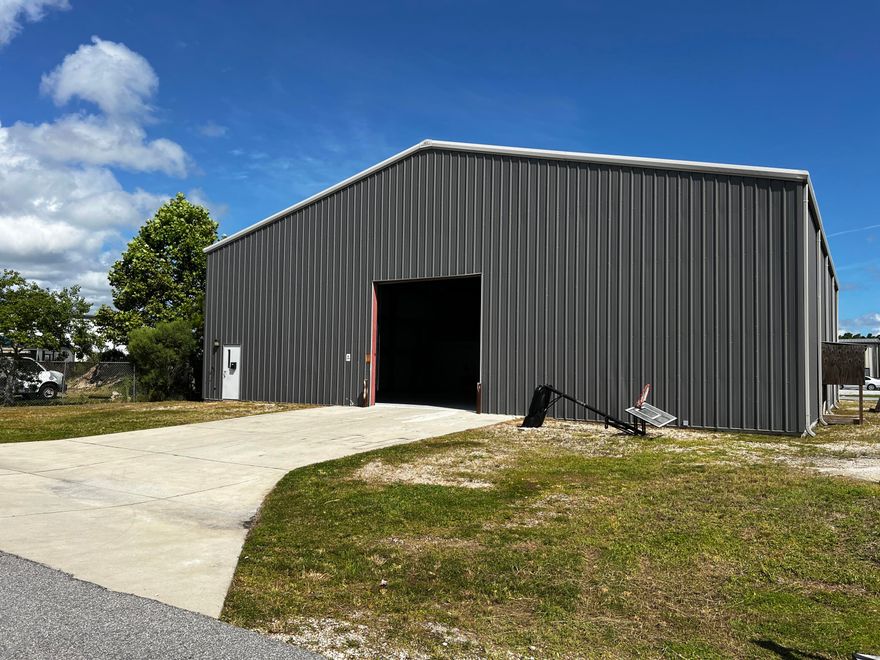 5,600 Sq. Ft. warehouse on Holley Circle. The building includes two 12' x 12' street-level rollup doors on either side of the building, which provides easy access and drive-through capabilities. 20' clear-height at the eaves and 26' clear on center. +/-400 sq. ft. office. Zoned C-4, Research & Design within unincorporated Bay County, which is effectively 'light-industrial'. Located less than one-mile to the Navy Base.