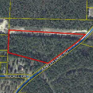 EXPANSIVE Vacant Parcel in Defuniak Springs! Perfectly located only 1-mile from Juniper Lake, this enormous 10-acre lot provides a multitude of development possibilities. Fully wooded and surrounded by personal residences, the property also creates an ideal opportunity for an impressive and private home. For investors and developers, the 10-acres may be appealing for a new neighborhood, condominium complex, or a mobile home/RV park. Situated only 1-hour from the world famous Emerald Coast, this area is extremely popular for tourists demanding reasonable and upscale accommodations. Whether a homeowner seeking a secluded paradise or an investor desiring positive residual income, this 10-acre parcel delivers both versatility and convenience. CALL TODAY for your private and exclusive tour!