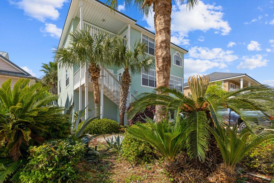 PRICE REDUCED 90,100. Great views of Garniers Bayou. Comes with boat slip 12 at the deep end of the the dock. One of the widest slips and has a boat lift. Seller has just installed $45,000 of new windows and the views are great. Repairs include $28,000 wood rot etc, and over $5,000 in plumbing repairs.  The first floor has 2 large bonus rooms with full bath. Huge garage with entry to the shower area coming off the pool.The 2nd floor has a 15x37 dining room, 2 living areas, the kitchen opens to the living areas. The master bedroom closet is large at 11x14.  3rd floor has 4 bedrooms and 3 full baths. This home has 9 and 10 foot ceilings through out. The seller has replaced some kitchen counter tops $1,965.  New garage door $5894 installed,  2 new a/c systems  $13,870 with a 10 yr warranty.