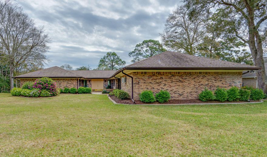 WATERFRONT HOME - Panoramic Views of Cinco Bayou!  3 BEDROOM + OFFICE, 1 Story, ALL BRICK Exterior, Screened in PATIO & Expansive Balcony, 2 CAR Garage + 1/2 Bath AND 2 CAR Carport!!  ...Gazebo with rustic grill (water), BOAT HOUSE with extra dock area for fishing (power & water), Newer Seawall, WHOLE HOUSE GENERATOR, 0.63 Acres, NO Flood Insurance Required And NO HOA!!!  Peaceful & PRIVATE LOCATION at the end of a cul-de-sac, This home is in great shape and has a good floor plan with VIEWS OF THE WATER from almost every room.  A little cosmetic updating to make it your own and you've got a REAL WATERFRONT GEM.  Buyer to verify all info on home.  Come see it TODAY!