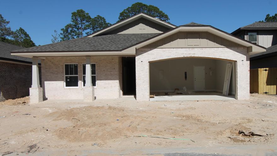 Welcome to Vieux Carre', a premier new 12 lot development featuring Craftsman style homes with a Louisiana flair. Homes feature slurried brick, hardy board siding, copper lanterns, etc. As you enter the front of this 4/2 home through the large covered porch with 8 Ft. solid wood stained front door, bedrooms 1 and 2 are on your left. The gourmet kitchen boasts custom Bisque painted cabinetry with crown moulding, 3 CM. granite countertops, Frigidaire Gallery series stainless appliances (including a commercial grade refrigerator/ freezer), and roomy breakfast bar.