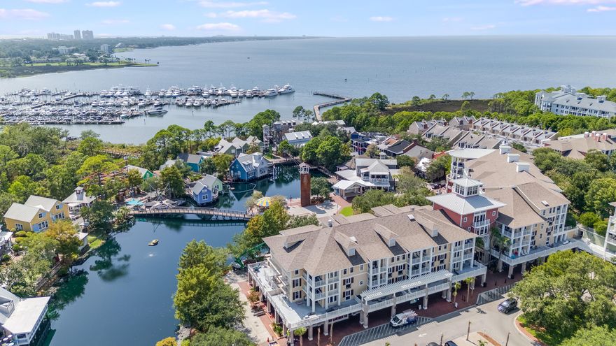 Wake up to tranquil Choctawhatchee Bay views as you're less than 680 feet to the Bay and you have the most beautiful bay views from your own private balcony.   End the day watching ocean sunsets at the Emerald Coast, less than 2 miles away. This 4th-floor balcony condo is tucked inside the gated Sandestin Golf & Beach Resort, this beautifully furnished 1-bed/1-bath residence in Bahia delivers the easy, all-in resort lifestyle and just steps to Baytowne Wharf dining, boutiques, the marina, and miles of trails. Inside, a bright open plan flows to the balcony; the kitchen was refreshed in 2024 with Samsung stainless appliances including an induction range and the bedroom received new carpet and designer pieces from Tuskers for a crisp, coastal vibe. The home conveys turnkey and includes a 2023 six-passenger golf cart so you can glide to the beach, pools, or evening events at the Village. Proven performer with about $37,000 in 2024 rental revenue.  Use and enjoy and then let it earn when you're away. Owners and/or guests love Bahia's lagoon-style heated pool & hot tub, fitness access, and proximity to golf, tennis, and Baytowne Marina; owners also enjoy the Solstice Club, a bayfront lounge with grills, screened porch, and fireplace and perfect for all your gatherings. Resort living, simplified and simply gorgeous.