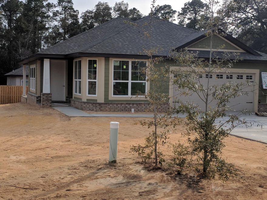 Now being built . . Craftsman style 3BR/2BA Cottage in The Canopies. Hardiboard siding with brick accents and covered back porch on nice cul-de-sac lot. Home has 9' and vaulted ceilings, two car garage, granite counters, durable vinyl plank flooring and more. Community pool and playground! Seller pays closing costs (except pre-paids) with approved lender. 1,2 and 10 year warranties! Association fee is only $360/year! Seller also pays new buyer fee!