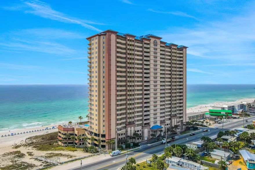 Welcome to this beautiful condo featuring one of the most sought-after layouts -- a Gulf Front Master Bedroom with direct balcony access and breathtaking, unobstructed views of the Gulf of America. This spacious unit also includes a large bunk room, allowing it to rent like a two-bedroom at the cost of a one-bedroom -- an incredible value and income opportunity. Inside, you'll find luxury vinyl plank (LVP) flooring throughout the main areas, with tile in the kitchen and bathrooms for durability and easy maintenance. The kitchen boasts granite countertops, hardwood cabinets, and newer appliances, perfect for cooking and entertaining. The master suite offers stunning Gulf views, private balcony access, and a spacious en-suite bathroom featuring a double vanity, soaking tub, & separate shower. The bunk room comfortably fits a large bunk bed, nightstand, and built-in shelving. Step outside to the expansive balcony  perfect for enjoying morning coffee or evening sunsets over the water.