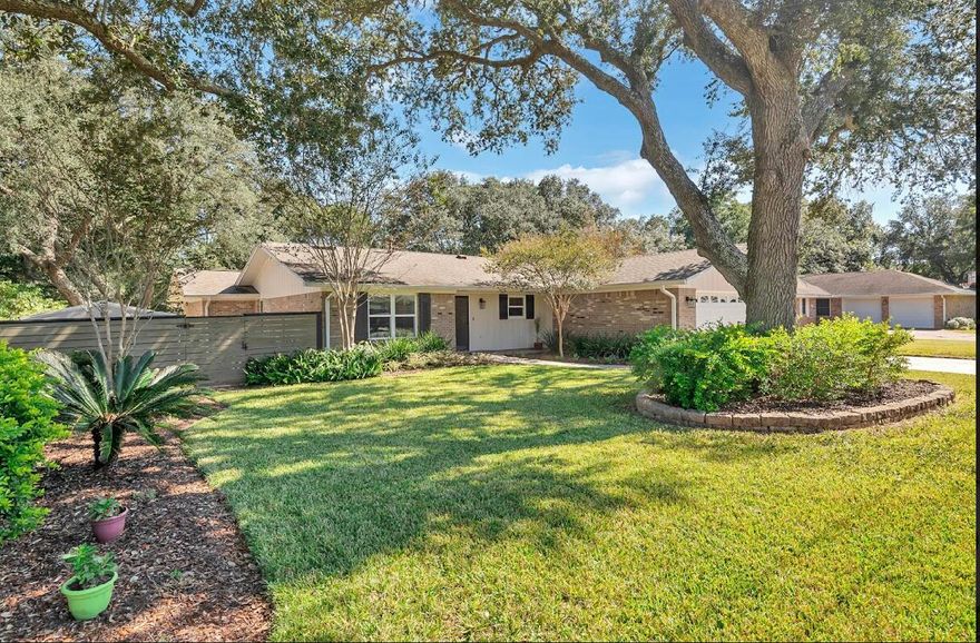 When you walk in, you have a feeling of being home! An open concept living area provides a designated dining area as well as two separate living spaces. You will also find a fully appointed kitchen with a bar. Enjoy the open feel while giving the family the opportunity to spread out. The yard is gorgeous!! The pool, landscaping and covered dining and sitting area will beacon you to sit down, relax and stay. The detail in the fencing is amazing!  A split floor plan provides privacy as the two master suites are in an opposite location of the home. The remaining two bedrooms are in a third area and share a bathroom.  The garage provides parking for two vehicles and additional space for either a workshop or storage.  Truly a lovely home.  You should love where you live!!