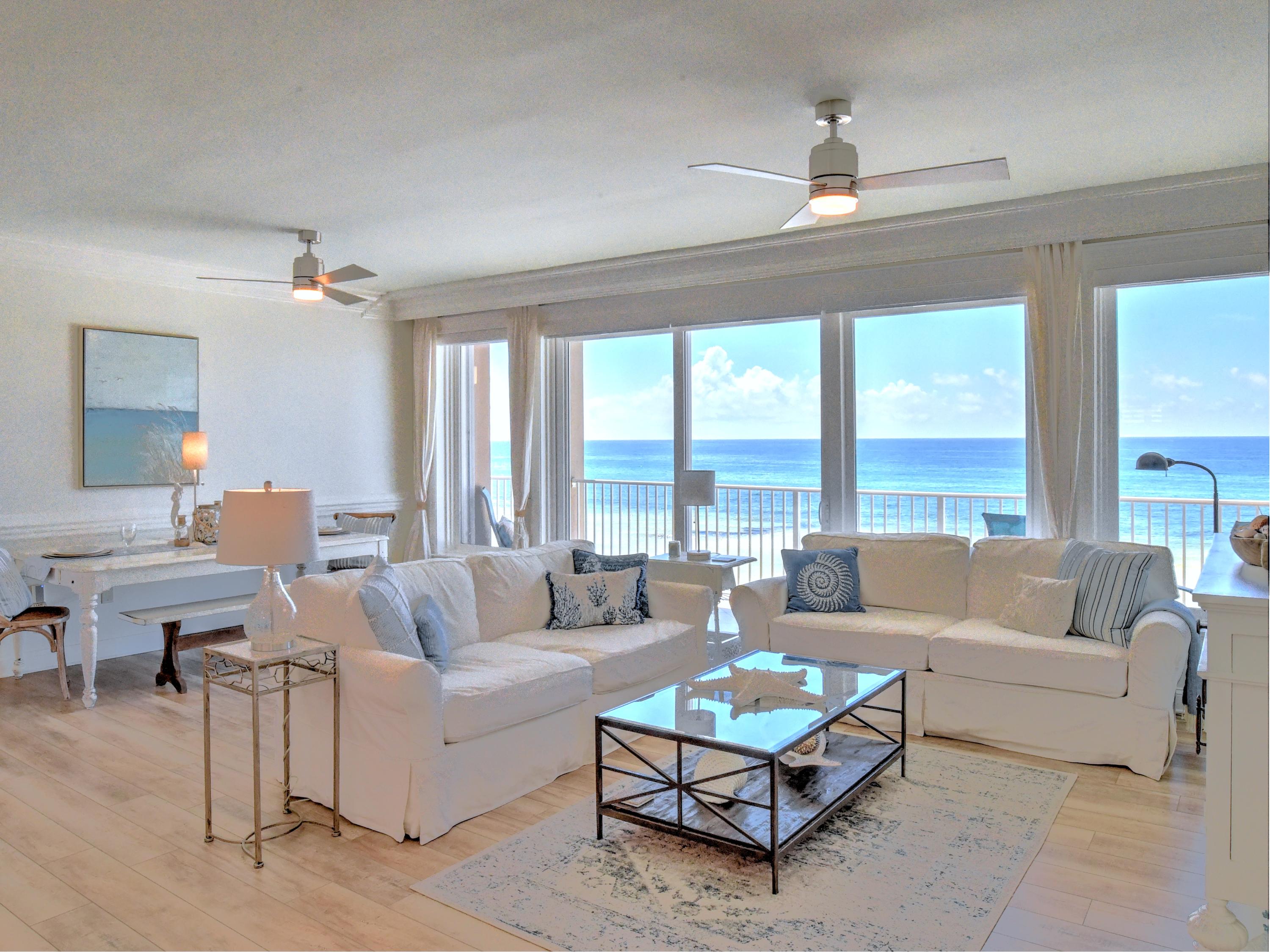 Now being offered furnished was a few exceptions. Living on the beach is truly a one-of-a-kind experience. From the familiar scent of salty air as the breeze blows, the squeak of the sugar white sand beneath your feet, to the most gorgeous sunrises/sunsets viewed from the private 50' balcony. Time moves more slowly on the water because every day feels like a never-ending vacation. As you enter this fabulous condo the amazing view will captivate your eyes as well as your heart. Step out on the 50' tiled balcony from the living room or either bedroom and absorb the panoramic view of the beach. Enjoy your morning cup of coffee and take in the sunrise or relax at the end of the day and watch the glorious sunsets.
