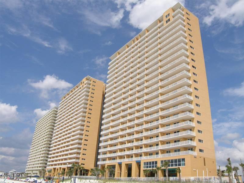 The best of the beach at Splash, located on the West end of the gorgeous beaches of Panama City. This professionally decorated, professionally painted, Paradise floor plan with a lock-out suite conveys fully furnished with contemporary furnishings plus original art and photography. This unit is a POWERHOUSE RENTAL!!! Because of the lock-out, the unit can be rented as a large 3bed/3bath or a combination of a 2bed/2ath and 1bed/1bath. Such flexibility helps you maximize your rental income potential! A coveted corner location, this condo boasts amazing Gulf views from inside and outside - extra windows on the side to maximize your views from the inside and three separate balconies providing plenty of vantage points on the outside