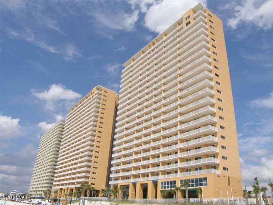 The best of the beach at Splash, located on the West end of the gorgeous beaches of Panama City. This professionally decorated, professionally painted, Paradise floor plan with a lock-out suite conveys fully furnished with contemporary furnishings plus original art and photography. This unit is a POWERHOUSE RENTAL!!! Because of the lock-out, the unit can be rented as a large 3bed/3bath or a combination of a 2bed/2ath and 1bed/1bath. Such flexibility helps you maximize your rental income potential! A coveted corner location, this condo boasts amazing Gulf views from inside and outside - extra windows on the side to maximize your views from the inside and three separate balconies providing plenty of vantage points on the outside