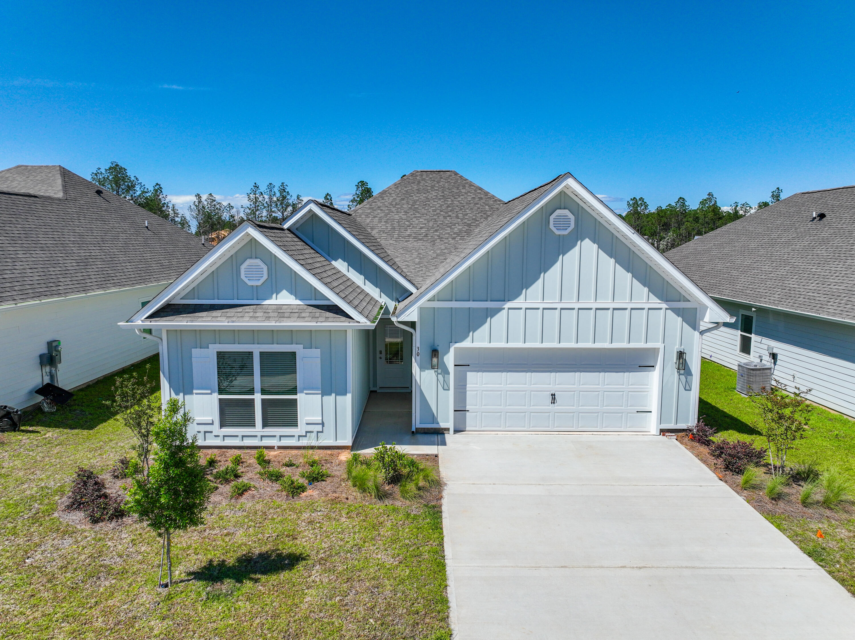 Welcome home to Walton's Landing! This home, the Kennedy floorplan, is a single-story with 4 beds/ 3 full baths + a bonus room/office on a premium interior lot backing up to a small pond. It boasts ample outside living space, trendy finishes throughout, 9' ceilings, EVP flooring, stainless appliances (also including refrigerator, washer and dryer), quartz countertops, painted cabinetry, designer lighting, and window treatments throughout. Walton's Landing is conveniently located in South Walton County, less than 4 miles to the public beach access on Scenic 30A, less than 7 miles to upscale shopping and restaurants at Grand Blvd and Sacred Heart Hospital. South Walton County is proud to have some of the best public schools in Florida, which have repeatedly achieved the coveted 'A' rating