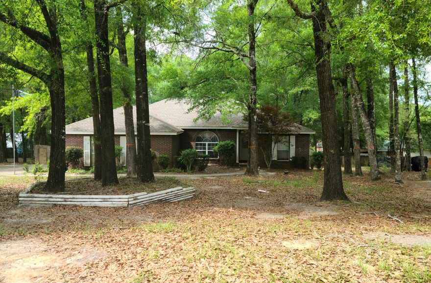 ALL BRICK HOME IS NESTLED AMONG THE LARGE OAK TREES ON A .47 ACRE LOT IN INDIAN TRAILS. 9' CEILING ENHANCES THE FOYER AND DINING AREA. GAS LOG FIREPLACE WITH BRICK CUSTOM-MADE MANTLE COMPLIMENTS LARGE 15' X 20' LIVING ROOM WITH CATHERDAL CEILING. MASTER BATH W/6' X 10' WALK-IN CLOSET. FRENCH DOORS LEAD TO THE 12' X 18' REAR WOODEN DECK PIPED FOR NATURAL GAS TO MAKE THOSE WEEKEND BARBECUES A BREEZE. SPRINKLER SYSTEM FOR SHRUBS; ALSO A BRICK MAILBOX.