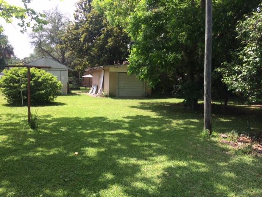 Beautiful lot in Fort Walton Beach! Great tall trees and lots of shade. Close to everything. Two small out buildings are on property, one shed, one garage. Survey available upon request.