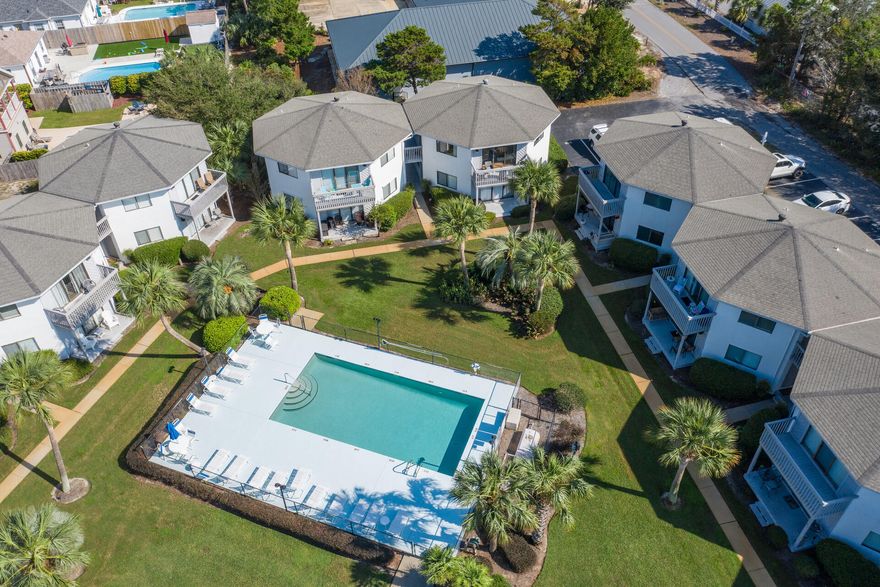 A RARE FIND in the Quiet Community of Crystal Village only 2.5 Blocks from Pompano Joe's Beachfront Restaurant and the Breathtaking sandy white beaches of the Emerald Coast.  Never miss a sunset in this TOP FLOOR END unit with a spacious deck overlooking perfectly manicured grounds and a community Heated pool.  This  uniquely private unit also features attic access, an in-unit lockout closet and clubhouse storage for additional space.  For a Vacation Rental or Full-Time residence THIS IS IT.  This home has been owner occupied and meticulously maintained. This is your Beach Home dream come true!