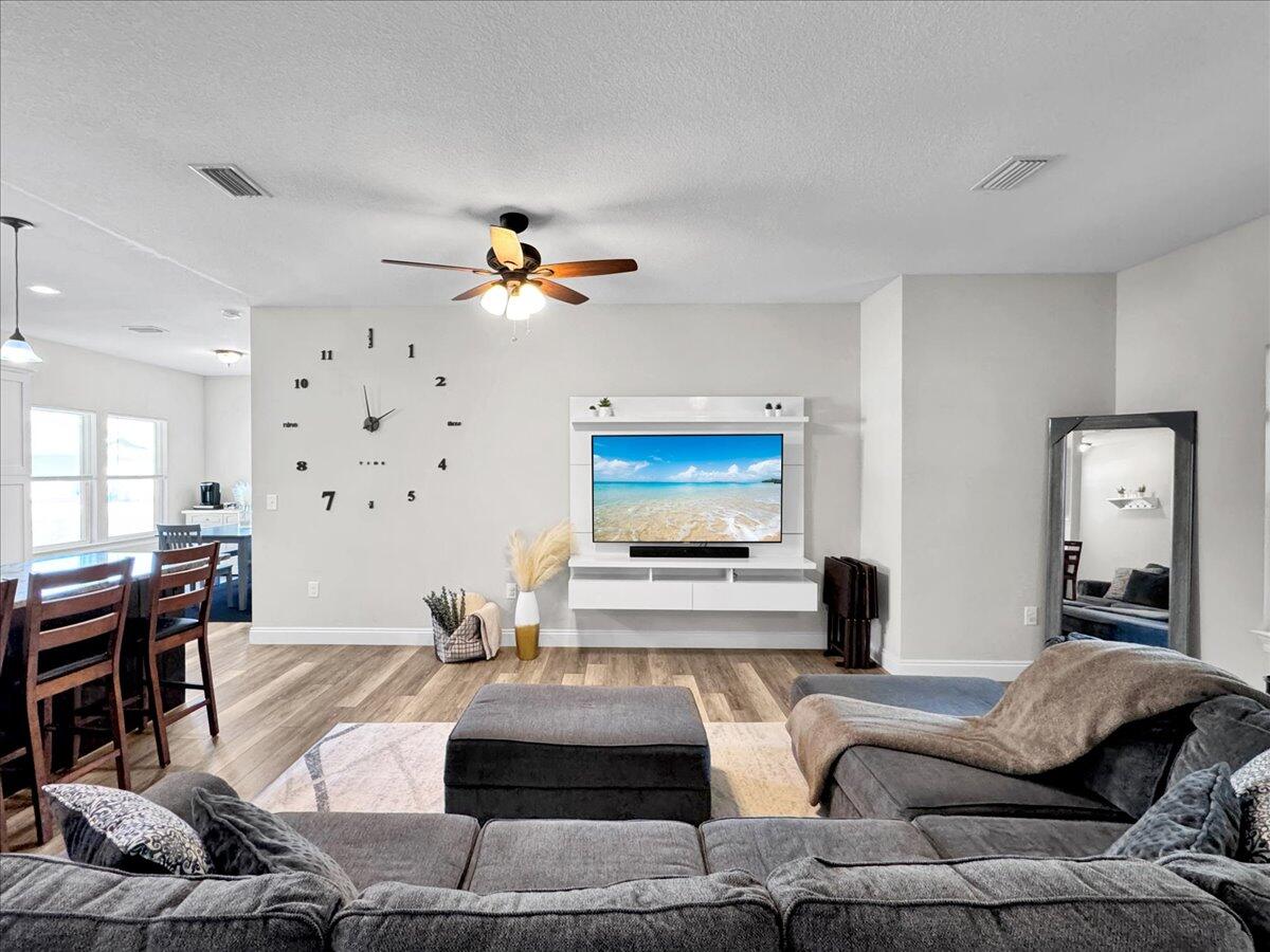 Imagine the entertainment opportunities for friends and family with the inviting, open and split bedroom plan. Only 8 miles and less than 15 minutes to Hurlburt Field, this inviting, open and split bedroom plan is amazing and offers a spacious kitchen with a breakfast bar, separate dining area and an expansive den. The opportunities abound for your new oasis which exudes comfortable living at its finest. Enjoy your outdoor living with the covered lanai and fenced-in back yard. What's more is you will save greatly on your electric bills from the solar panels that will be paid off by sellers at closing! The monthly bill is just $27/month, which is just the fee for the power connection. Don't miss this special opportunity! Bathrooms and laundry have beautiful porcelain tile and AT&T fiber optic is available in the neighborhood.