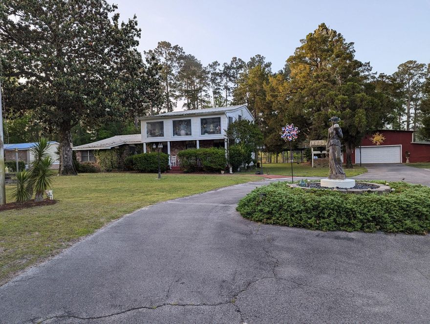 If you are looking for just the right property, this could be it!! An older home situated on 3.65 acres, with endless possibilities.  3 bedrooms, 3 baths and  with a guest house, garage with loads of work space. An estate sale will start on Thursday, Feb 5 ending on Saturday, Feb 7th.  Parcel is Zoned RV (rural village) .