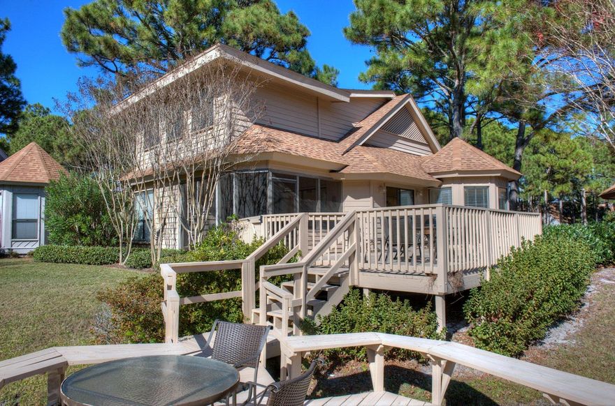 Water views of Eagle Lake in very popular The Fairways, a gated community. Spacious deck and dock to enjoy the Florida sunshine. This is a two story detached cottage-style home having an enclosed terrace that is heated and cooled off the master bedroom. This unit is sold furnished. Golf cart is included in sale. BBQ pit on the back porch does not convey.